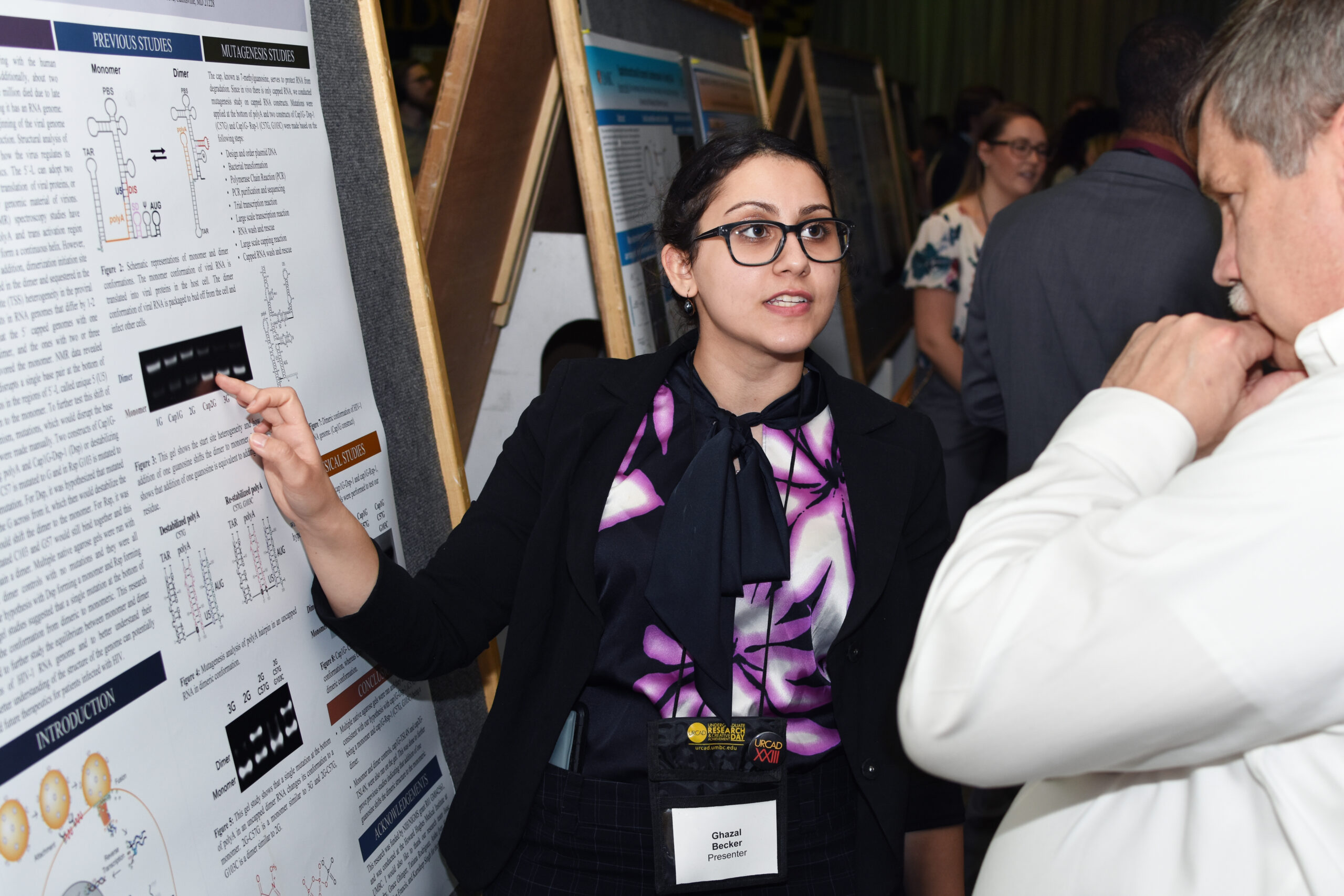 Ghazal presenting her poster presentation at URCAD